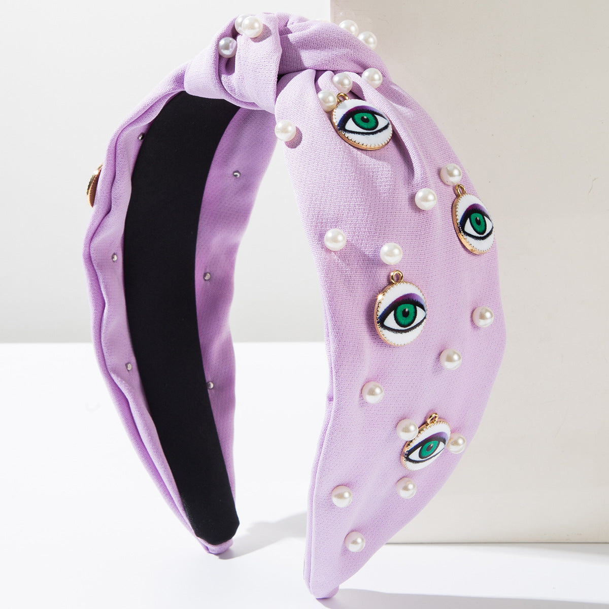 Wholesale Pearl round devil eye headband accessories